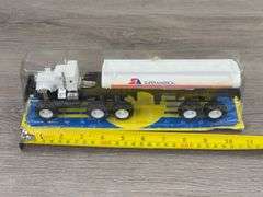 Super America Tractor Tanker, Super Friction Top Trucks, 10 3/4” Long, New Ray Toys, Plastic Not Fully Attached