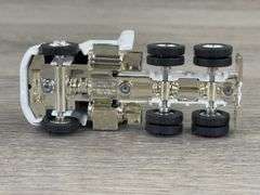 WhiteGMC WCA Conventional Aero McDonald Dairy Products Tractor W/Pup Trailers, 1/64, Ertl