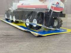 Super America Tractor Tanker, Super Friction Top Trucks, 10 3/4” Long, New Ray Toys, Plastic Not Fully Attached