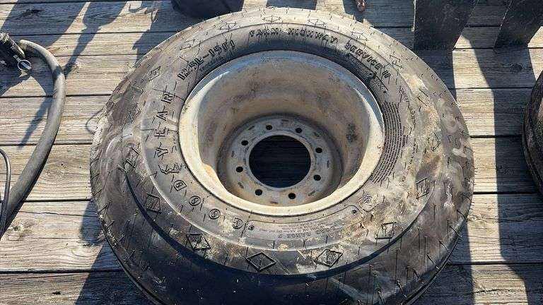 Goodyear 12.5L-15 Tire and 8 Bolt Rim