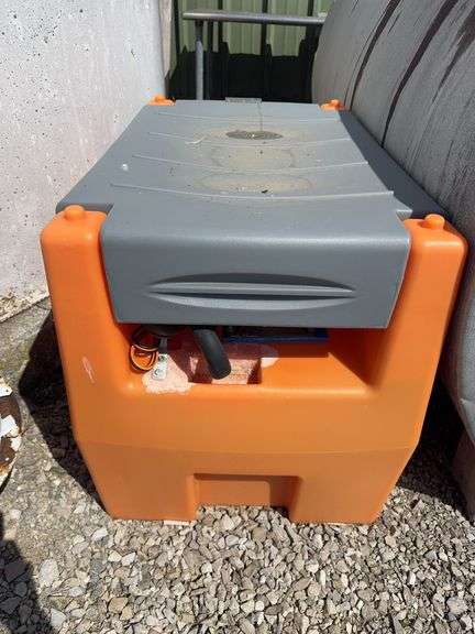 DEF storage Tank with 12 Volt Pump - Tank is 1/2 full - 25” tall x 22” wide x 33” long