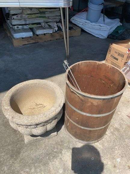 Concrete planter and wood barrel