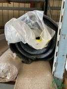 14 rolls of carpet and roll of vinyl
