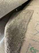 14 rolls of carpet and roll of vinyl