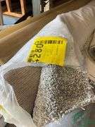 14 rolls of carpet and roll of vinyl