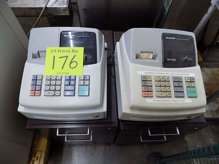Two Sharp Electronic Cash Register