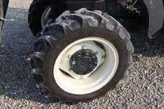 NEW HOLLAND TN95FA MFWD TRACTOR/LOADER - Shackelton Auctions Inc.