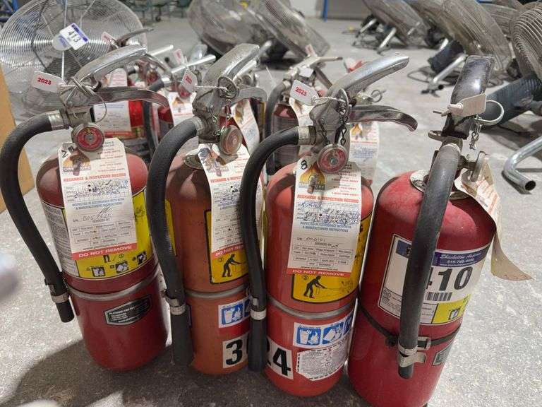 FOUR FIRE EXTINGUISHERS