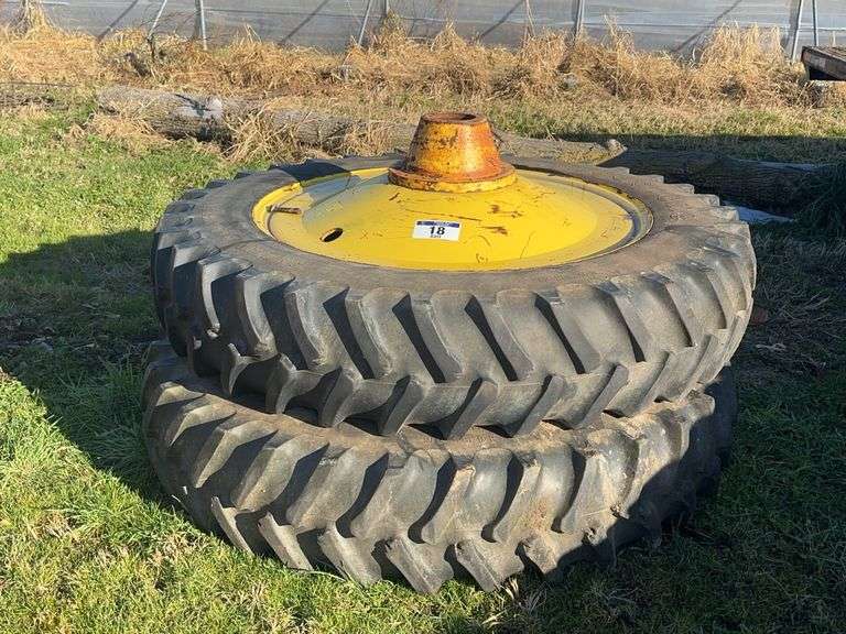 PAIR OF FIRESTONE 14.9R46 AXLE DUALS