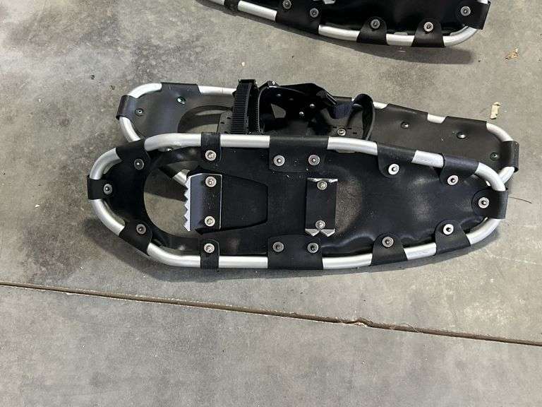 TWO PAIRS OF SNOW SHOES