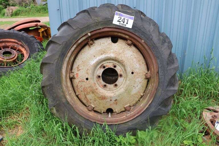 PAIR OF GOOD YEAR 11.2X28 TIRES AND RIMS - Shackelton Auctions Inc.