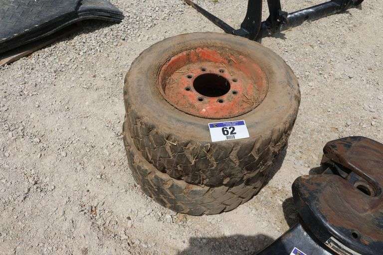 PAIR OF 8 BOLT SKID STEER TIRES & RIMS