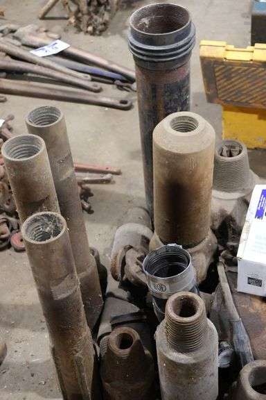 GROUP OF ASSORTED LARGE PIPE FITTINGS & ROTARY DRILL BITS