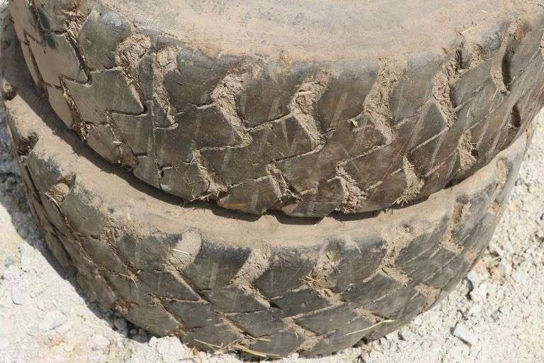 PAIR OF 8 BOLT SKID STEER TIRES & RIMS