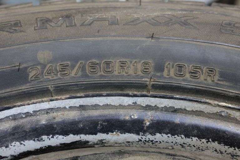 4 DUNLOP 245/60R18 105R TIRES ON RIMS