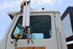 2001 INTERNATIONAL 8100 TANDEM AXLE ROLL OFF TRUCK