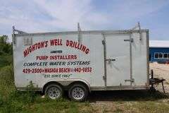 2005 CARMATE 7'X16' TANDEM ENCLOSED TRAILER