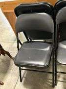 EIGHT FOLDING CHAIRS