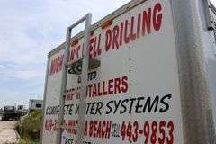 2005 CARMATE 7'X16' TANDEM ENCLOSED TRAILER