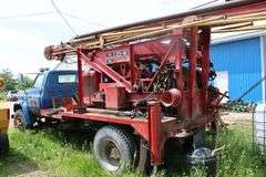 1983 GMC 7000 TRUCK & BUCYRUS ERIE 22W DRILL