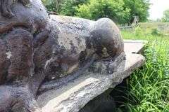 2 - 65" LONG CONCRETE LIONS