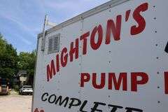 2005 CARMATE 7'X16' TANDEM ENCLOSED TRAILER