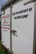 2005 CARMATE 7'X16' TANDEM ENCLOSED TRAILER