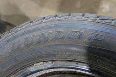 4 DUNLOP 245/60R18 105R TIRES ON RIMS
