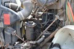 2001 INTERNATIONAL 8100 TANDEM AXLE ROLL OFF TRUCK