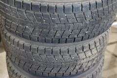 4 DUNLOP 245/60R18 105R TIRES ON RIMS