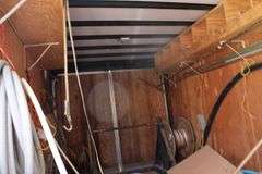 2005 CARMATE 7'X16' TANDEM ENCLOSED TRAILER