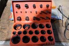 UNIVERSAL O-RINGS, HARD HAT, TACKLE BOX WITH CONTENTS, GUN CLEANING KIT ETC.