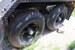 1977 HOMEBUILT TANDEM AXLE 20' PIPE TRAILER