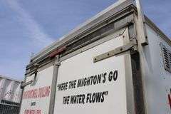 2005 CARMATE 7'X16' TANDEM ENCLOSED TRAILER