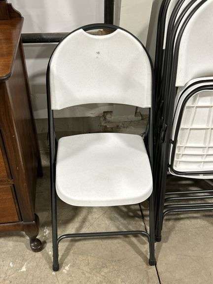 SEVEN PLASTIC  FOLDING CHAIRS