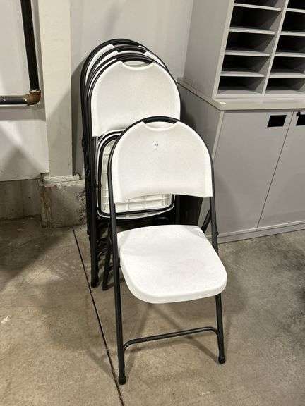 SEVEN PLASTIC  FOLDING CHAIRS