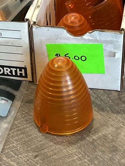 FOUR BOXES OF ASSORTED LIGHTS AND LIGHT CAPS