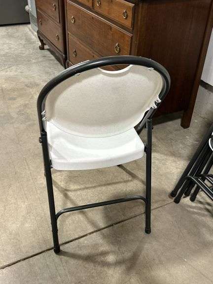SEVEN PLASTIC  FOLDING CHAIRS
