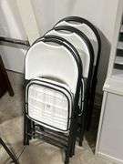 SEVEN PLASTIC  FOLDING CHAIRS