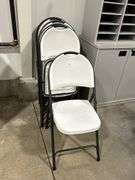 SEVEN PLASTIC  FOLDING CHAIRS