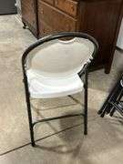 SEVEN PLASTIC  FOLDING CHAIRS