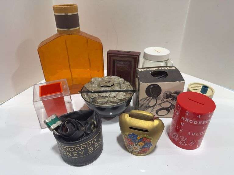 GROUP OF ASSORTED COIN BANKS - Shackelton Auctions Inc.