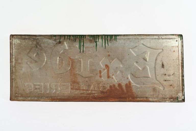 1938 EXIDE BATTERIES EMBOSSED TIN SIGN - Shackelton Auctions Inc.