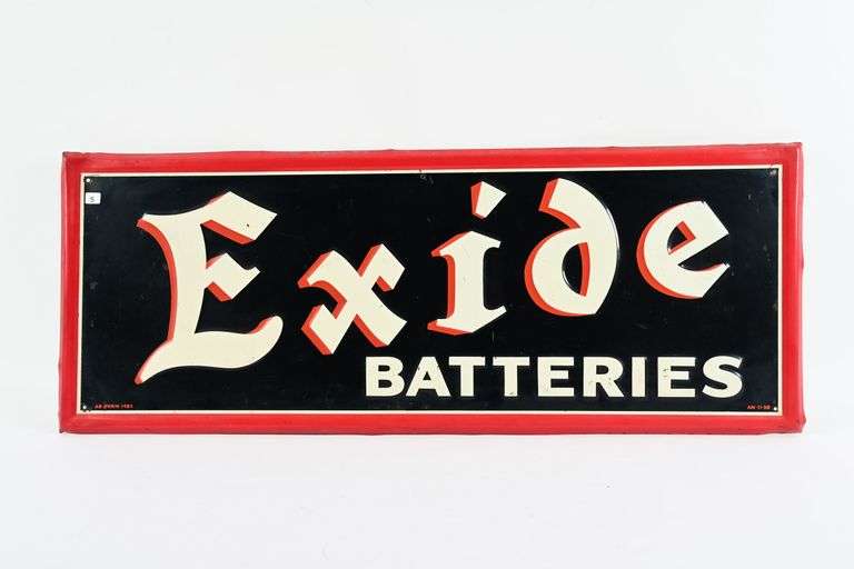 1938 EXIDE BATTERIES EMBOSSED TIN SIGN - Shackelton Auctions Inc.