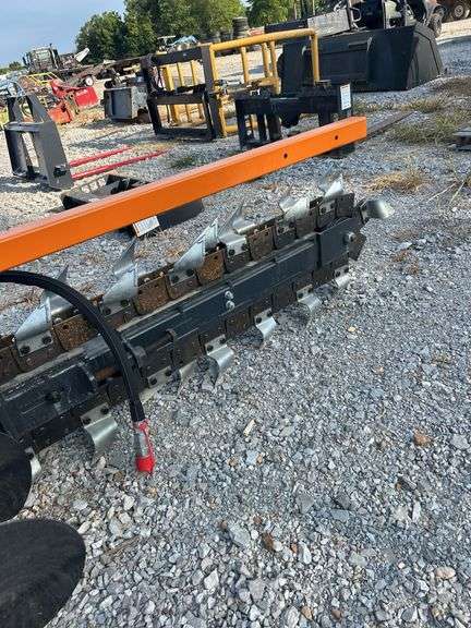 Unused Wolverine 72" Skid Steer Q/A Trencher