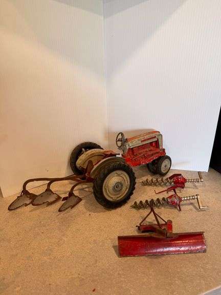 Ford Select Tractor with plow blade and 2 diggers