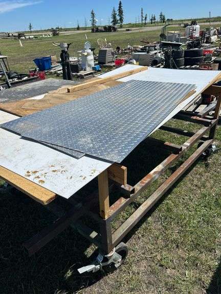 Homebuilt 2'' x 2'' Steel Rolling Frame w/ 8'' Swivel Wheels, 96'' x 48'' x wood top, 2 - 60'' Check Plates 24'' & 28'' *Unreserved*