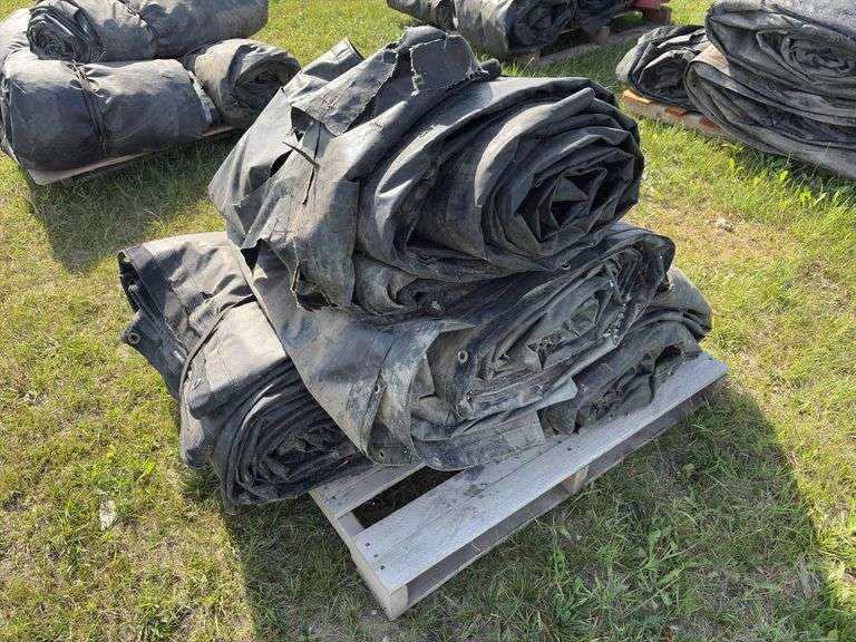 Assorted sizes of lumber & steel tarps, approx 4, *Unreserved*