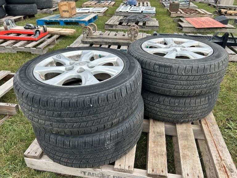 4 Goodyear Assurance Tires M&S  205/55R16, 4 Mazda 5 bolt rims, *Unreserved*