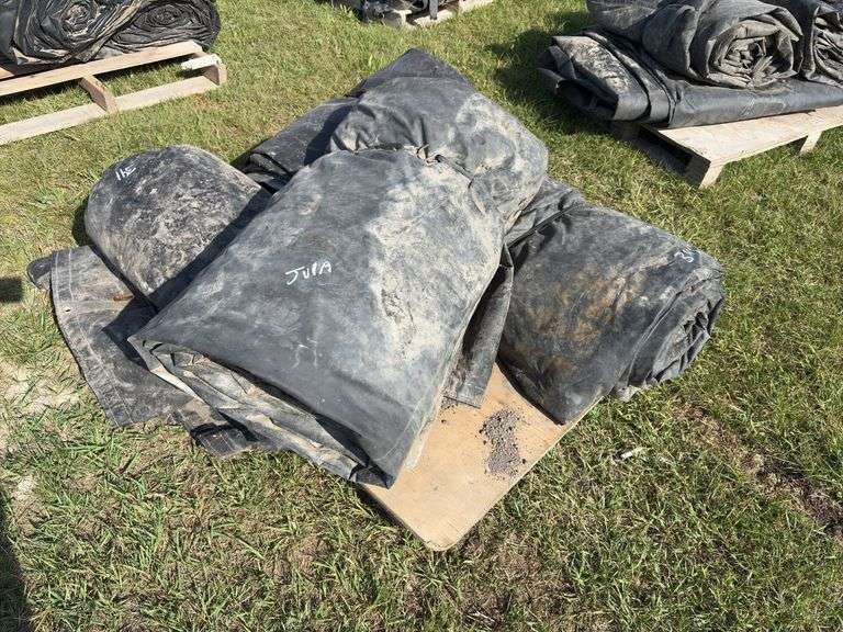 Assorted sizes of lumber & steel tarps, approx 4, *Unreserved*